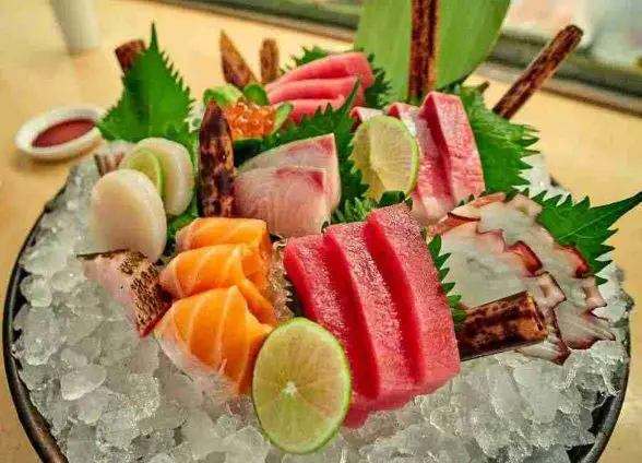 A plate of sashimi on ice