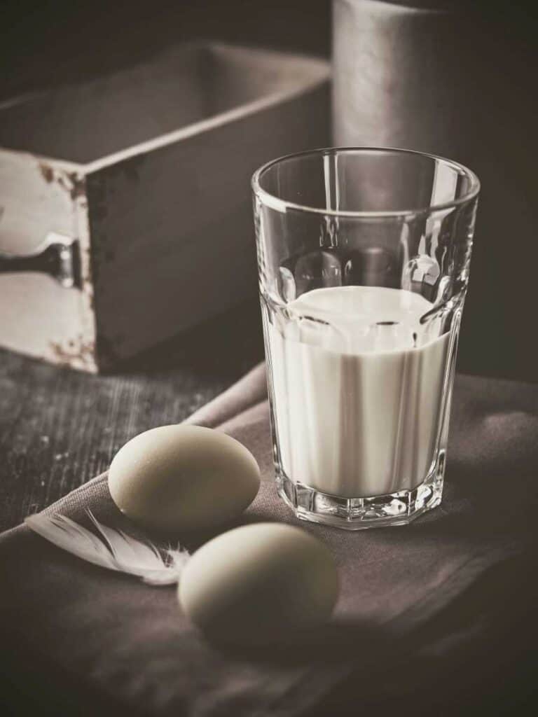 A glass of milk and two boiled eggs - milk is good as a part of the carnivore diet 