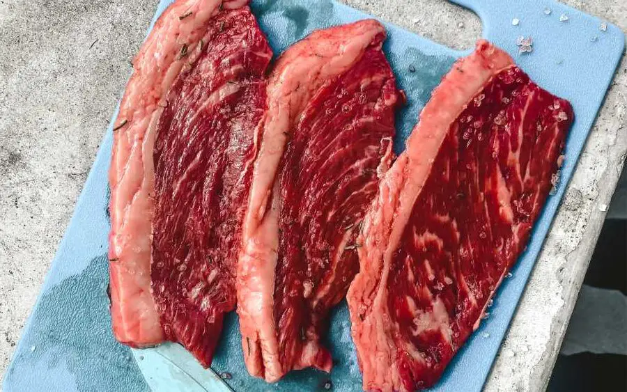 an image of three pieces of beef steak - you can eat as much beef as you want on the carnivore diet