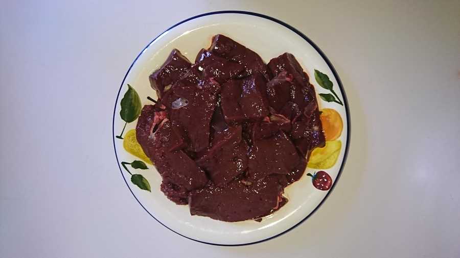 A plate of raw liver slices