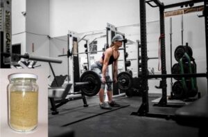 a jar of bone meal and a gym woman - bone meal is a great calcium supplement