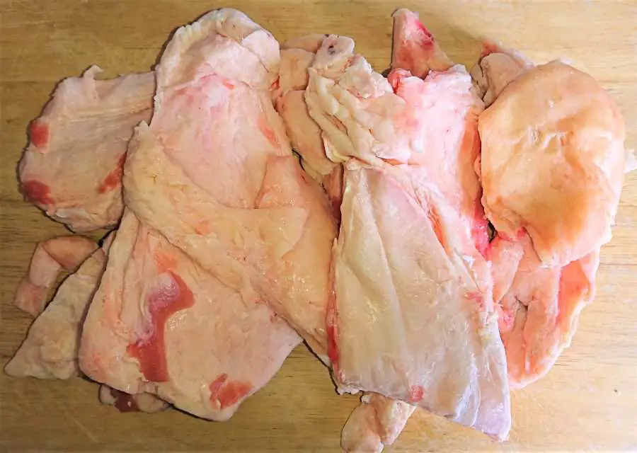 beef fat trimmings on a chopping board