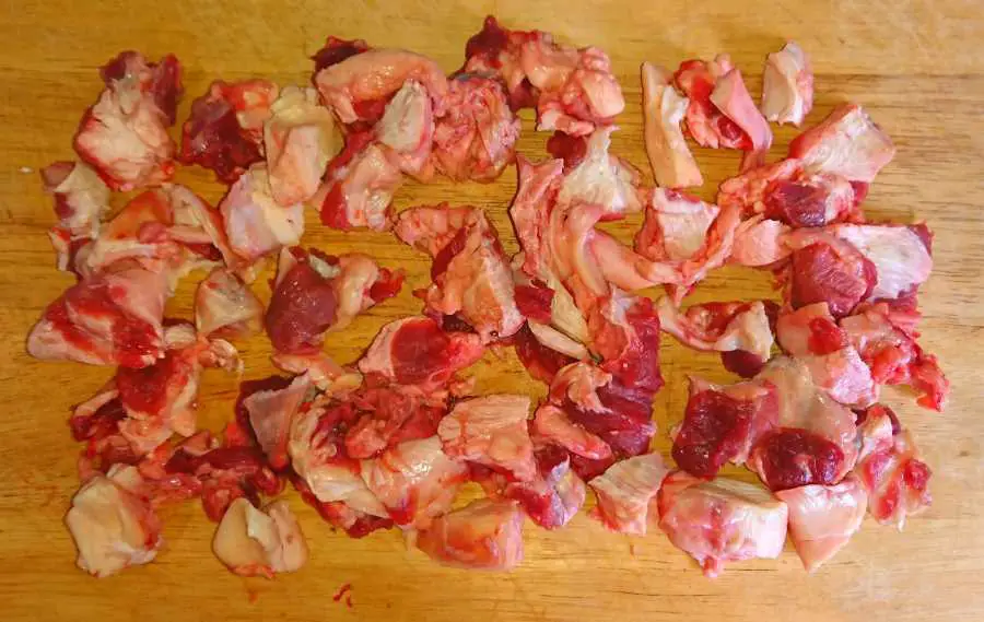 Small slices of beef tendons on a chopping board