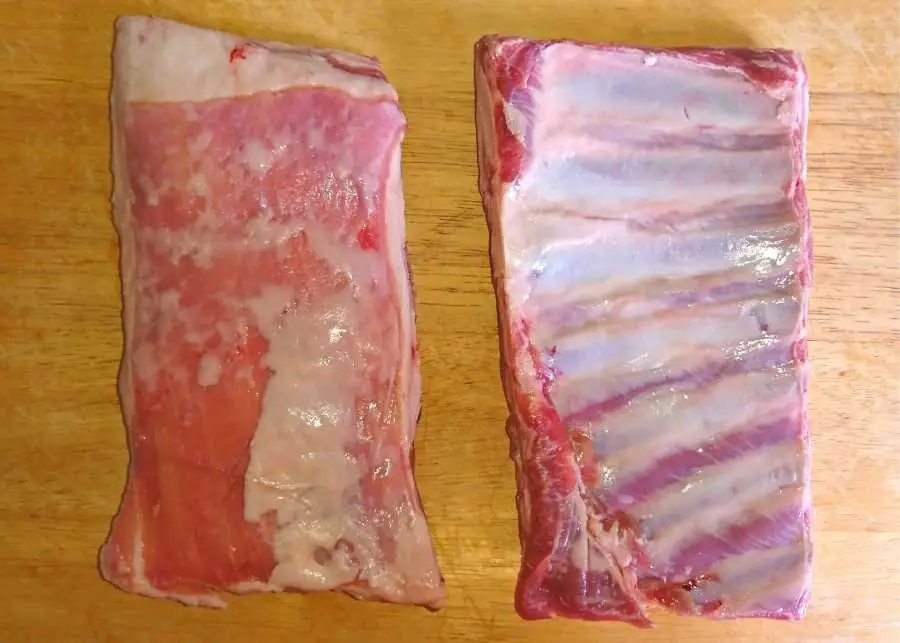 Two raw lamb rib racks