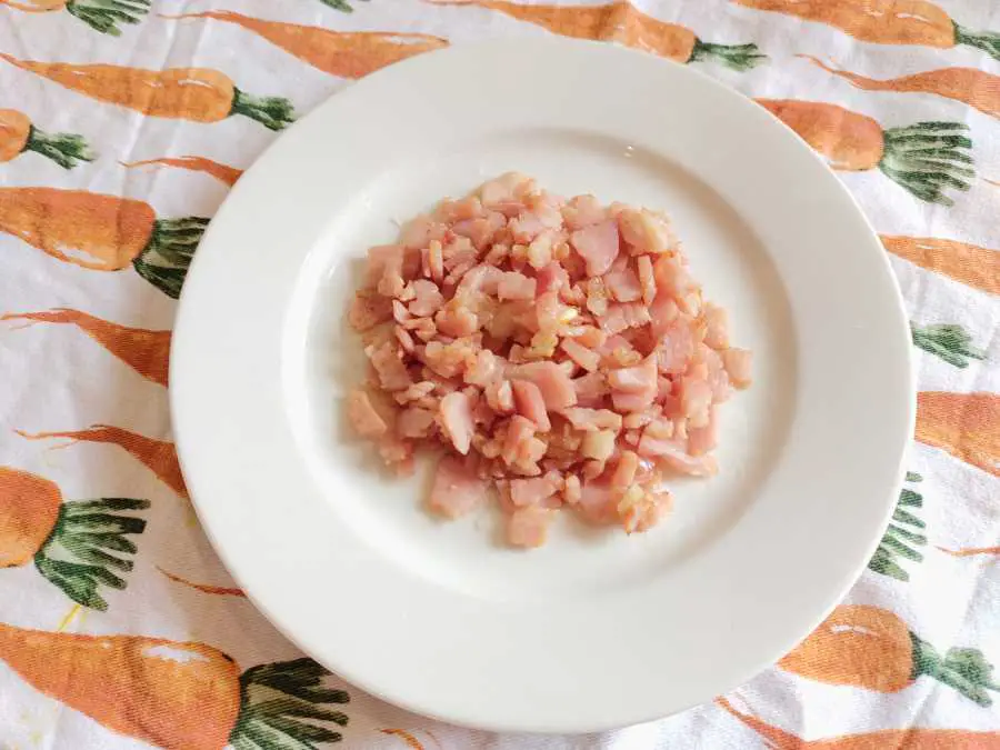 cooked bacon bits on a plate