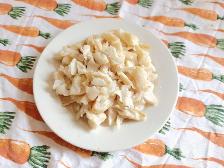 cooked white fish bits on a plate