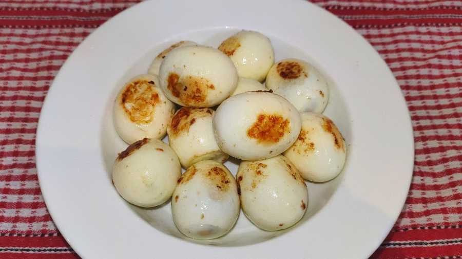 Boiled and fried eggs in a bowl
