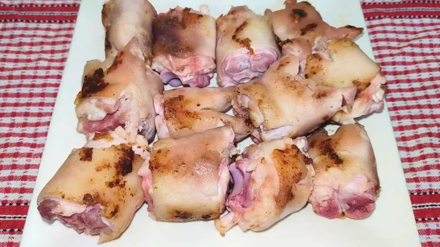 Browned pig trotter pieces on a plate