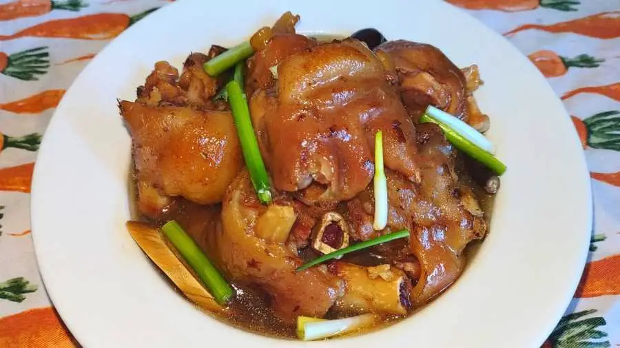 carnivore-ish braised pig trotters with herbs in a bowl