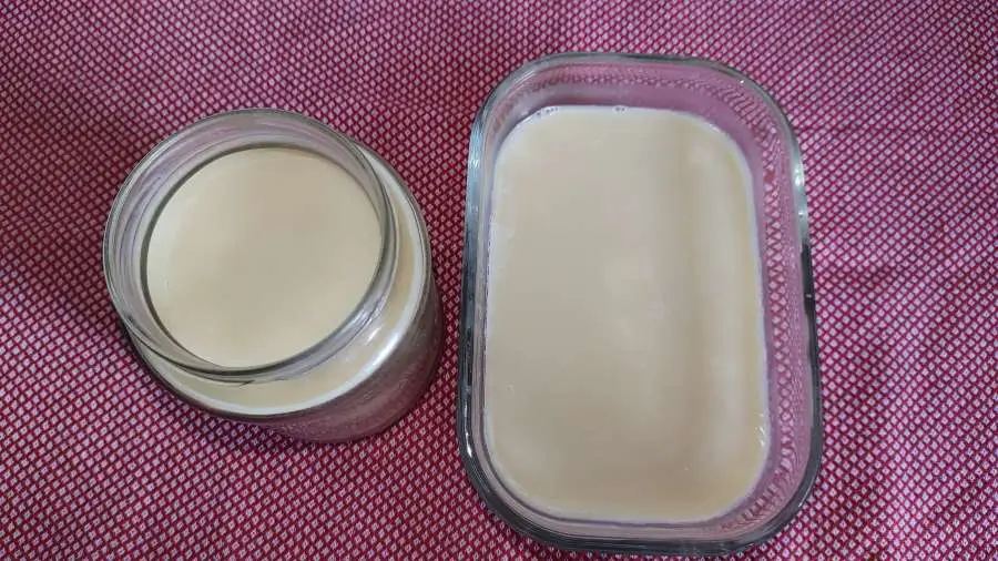 solid rendered beef fat (tallow) in a jar and a container)